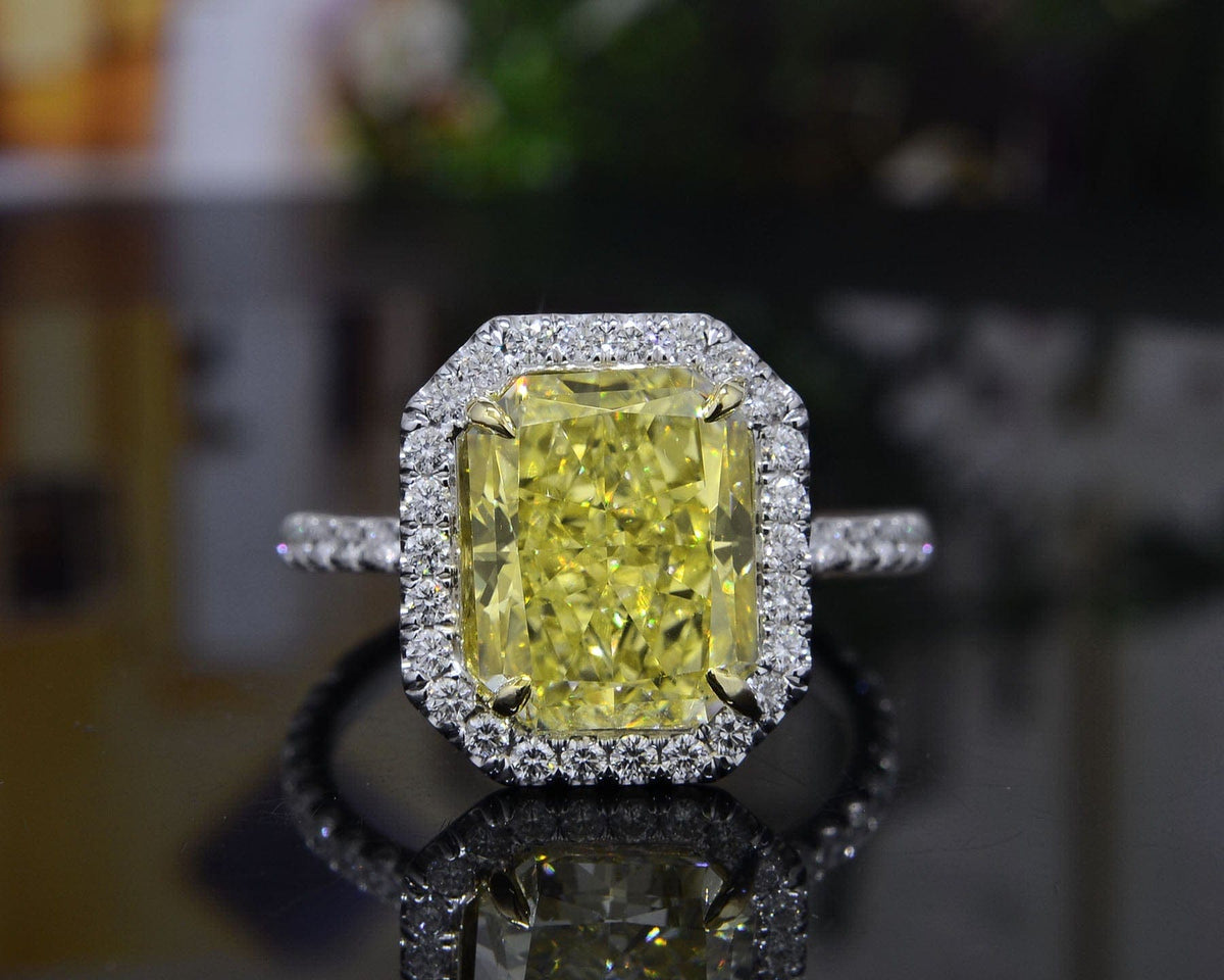 Fancy yellow radiant cut halo engagement ring