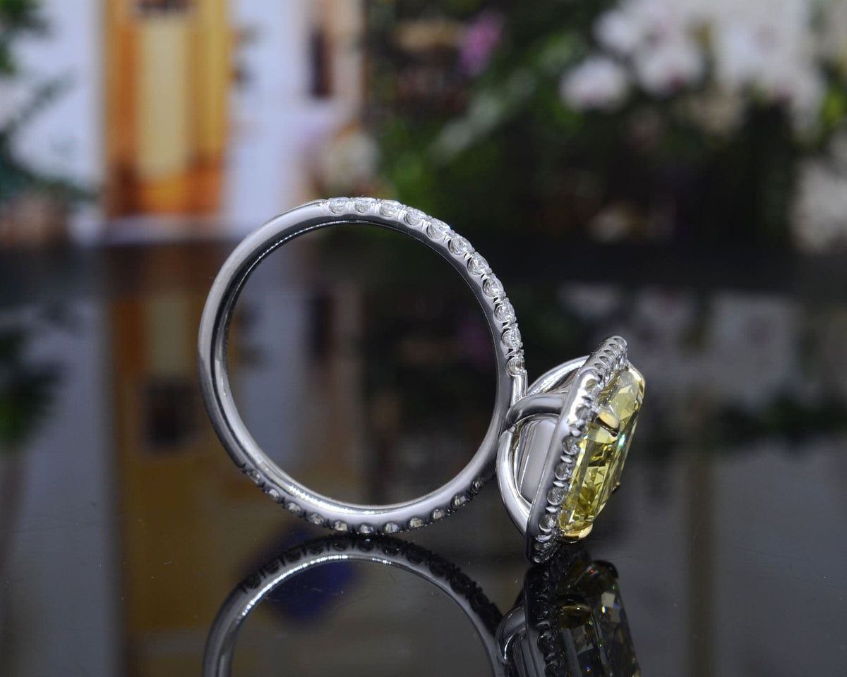 Fancy yellow radiant cut halo engagement ring profile view