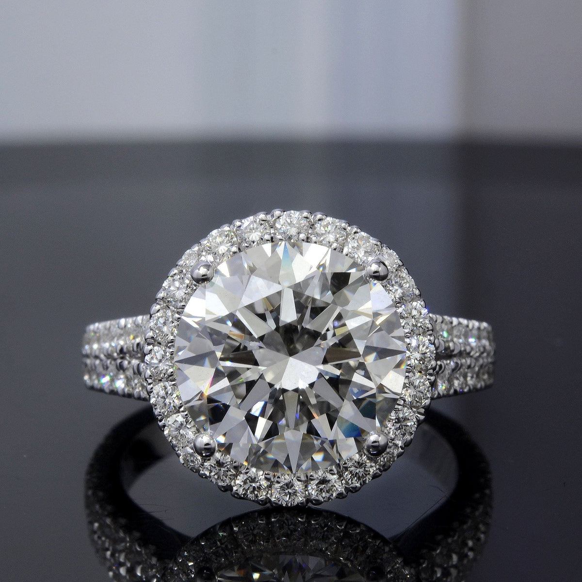 Halo split shank round cut diamond ring