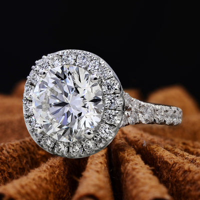 Round Cut Halo Split Shank Engagement Ring