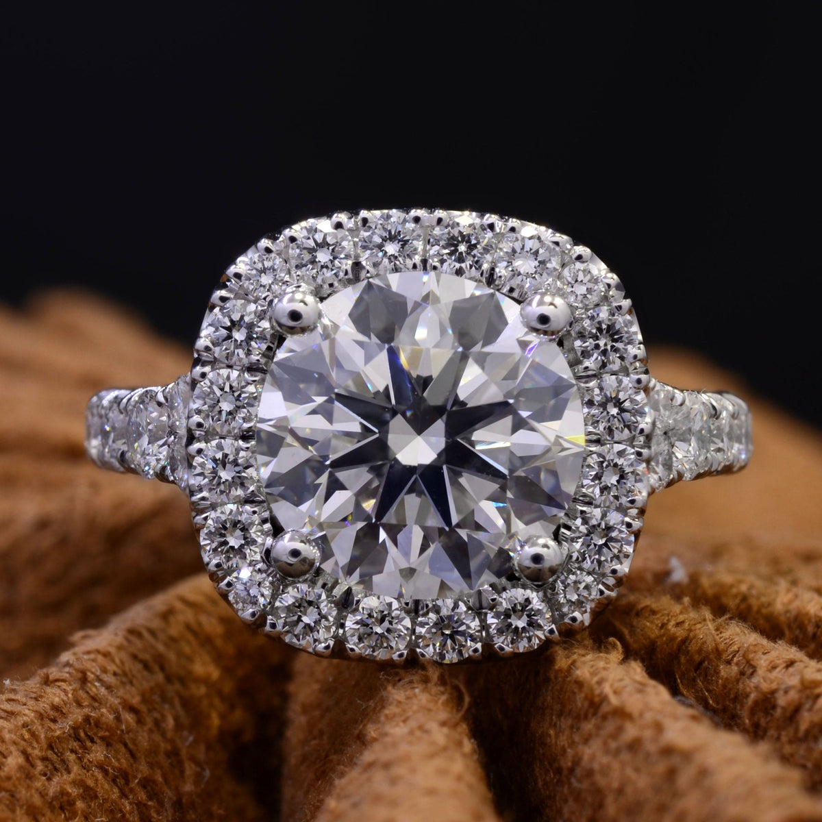 Round cut halo split shank engagement ring