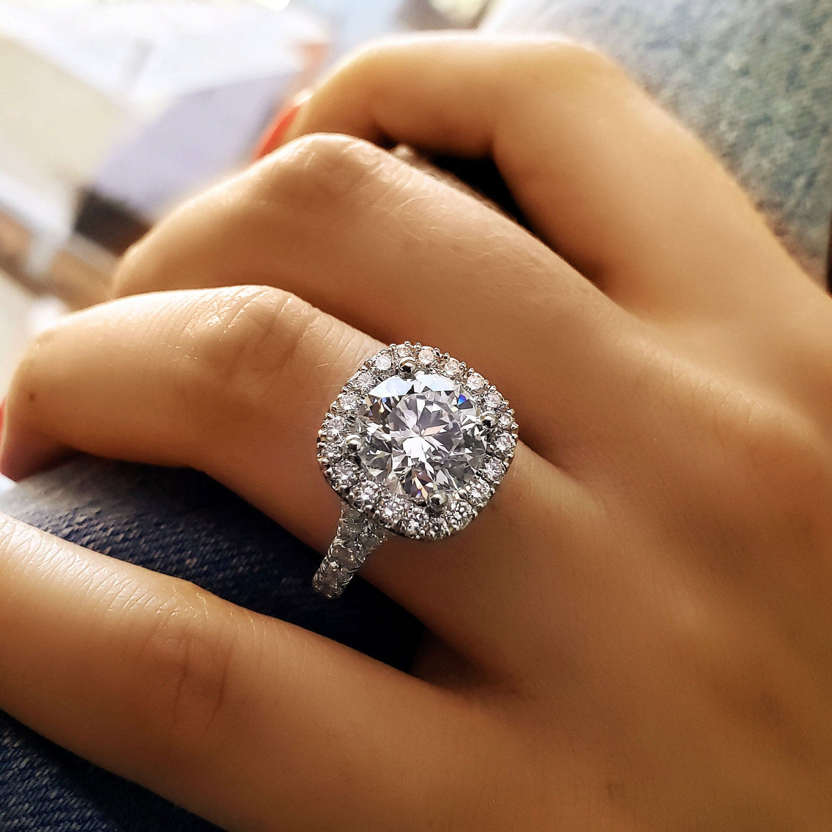 Round cut halo split shank engagement ring