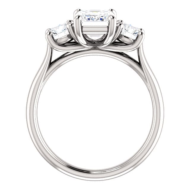 3 stone emerald cut engagement ring with rounds