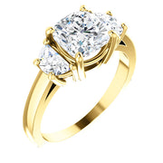 3 stone cushion cut engagement ring in yellow gold