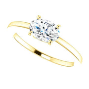 East West Oval Cut Diamond Solitaire Ring in yellow gold