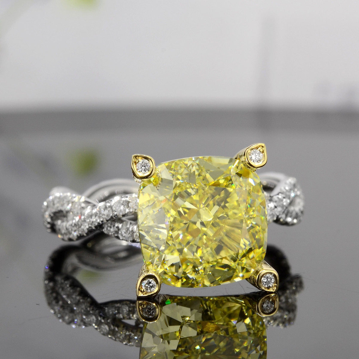 Yellow cushion cut diamond eternity twist ring