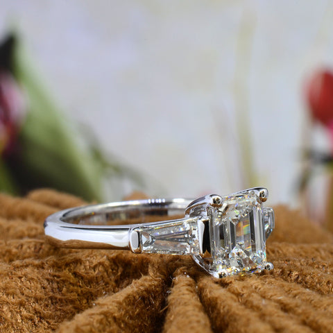 3 Stone Emerald cut diamond ring 