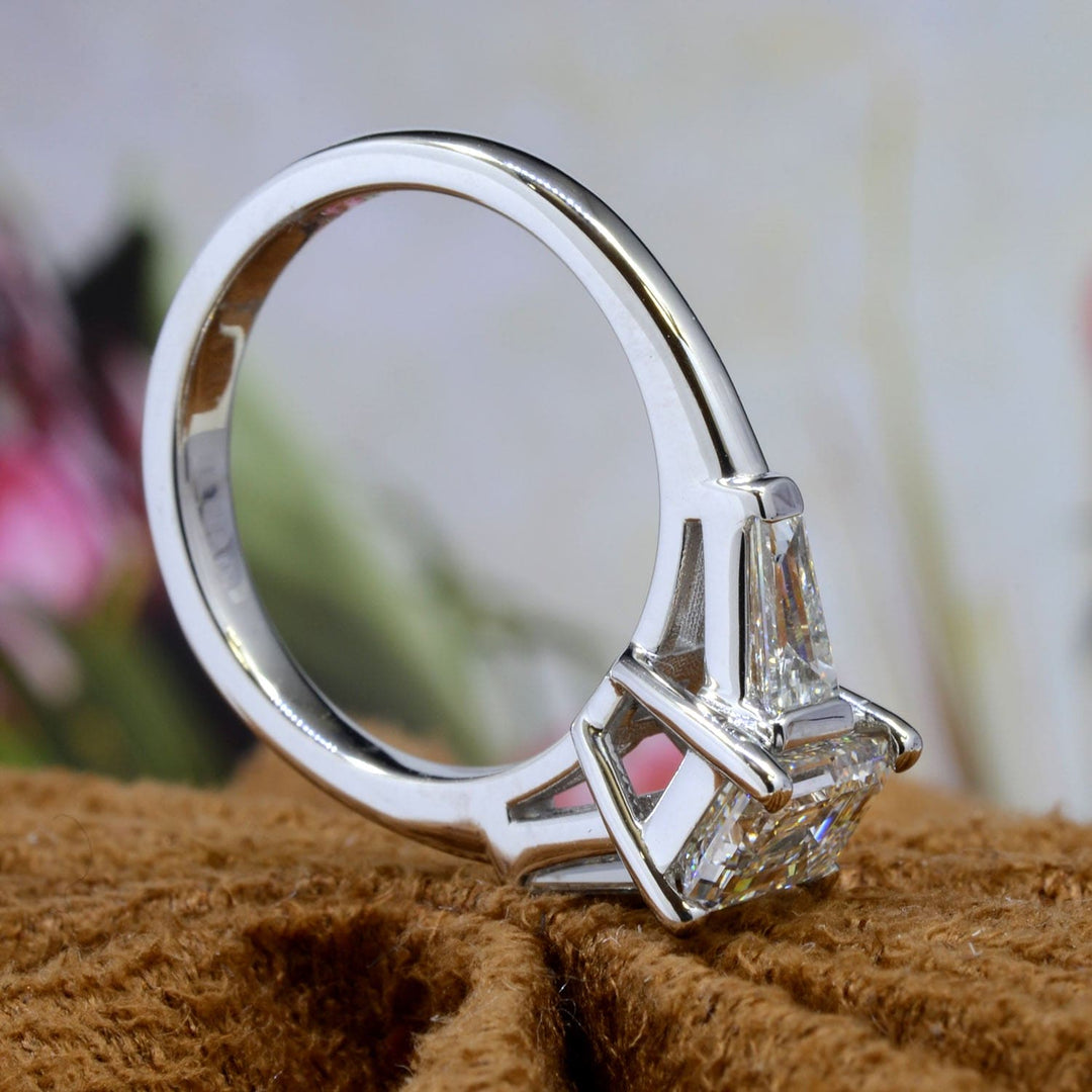 3 Stone Emerald Cut Diamond rings 