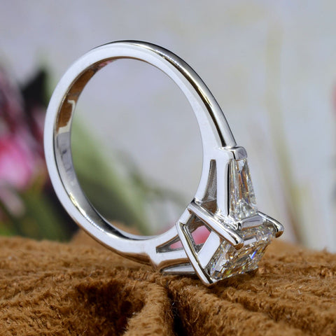 3 Stone Emerald cut diamond ring