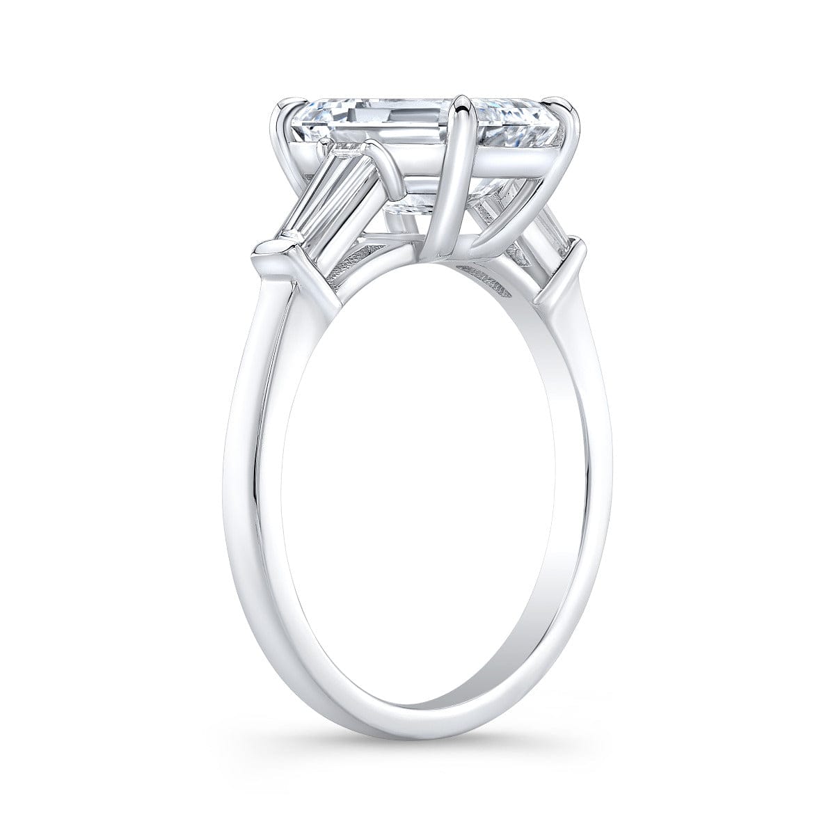3 stone emerald cut diamond ring profile view