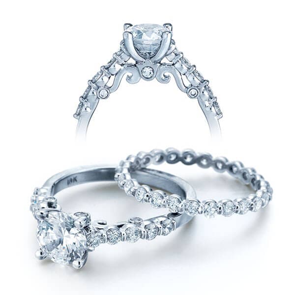 Round brilliant cut diamond verragio insignia shared prong engagement ring
