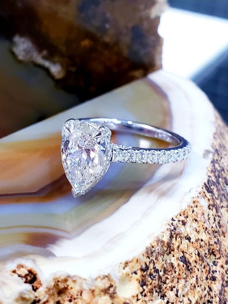 Hidden halo pear engagement ring