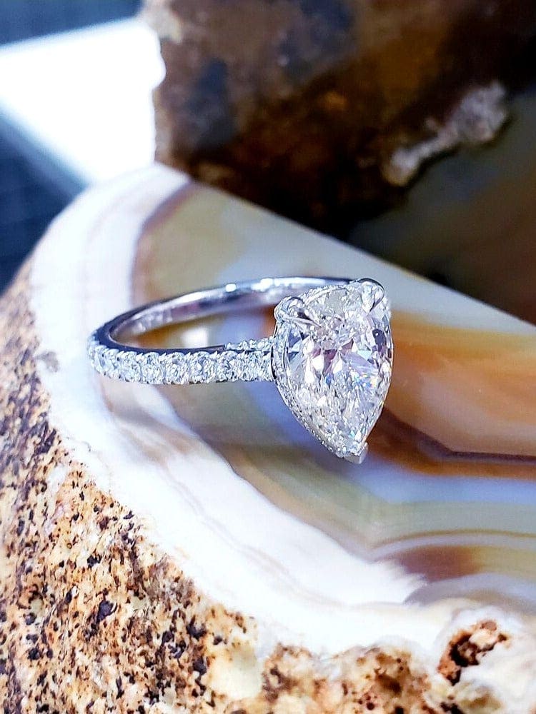 Hidden halo pear engagement ring