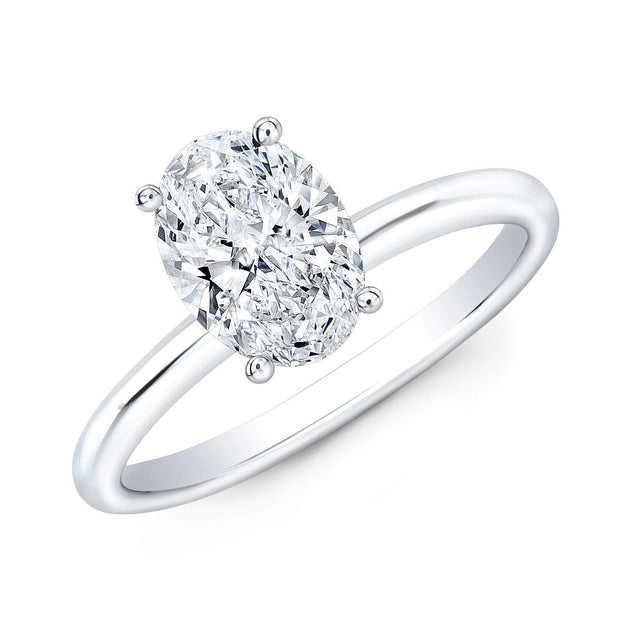 Four Prong Solitaire Ring