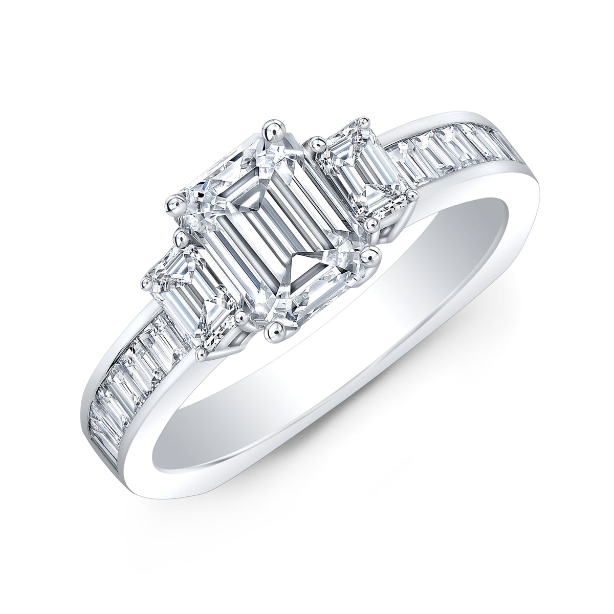 3 stone emerald cut diamond ring set with baguettes 