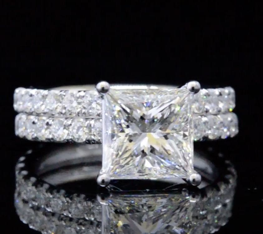 Princess cut diamond ring with matching band