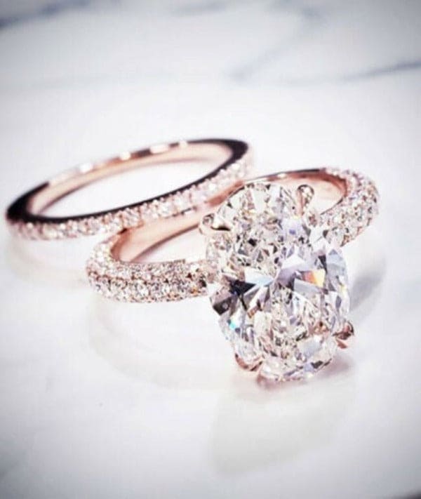 Hidden halo oval engagement ring